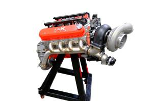 Chevy LS Single Turbo Header (Rear Crossover)--Angle Exit Variant-With Optional Turbocharger